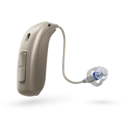 A Basic Hearing Aid Device Designed For Essential Hearing Needs Placed On A Soft Surface 1